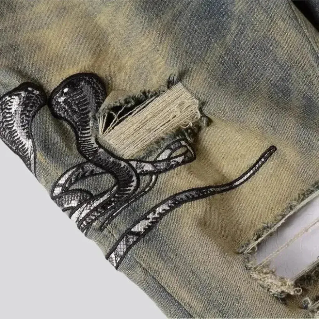 Mid-waist cobra-embroidery jeans